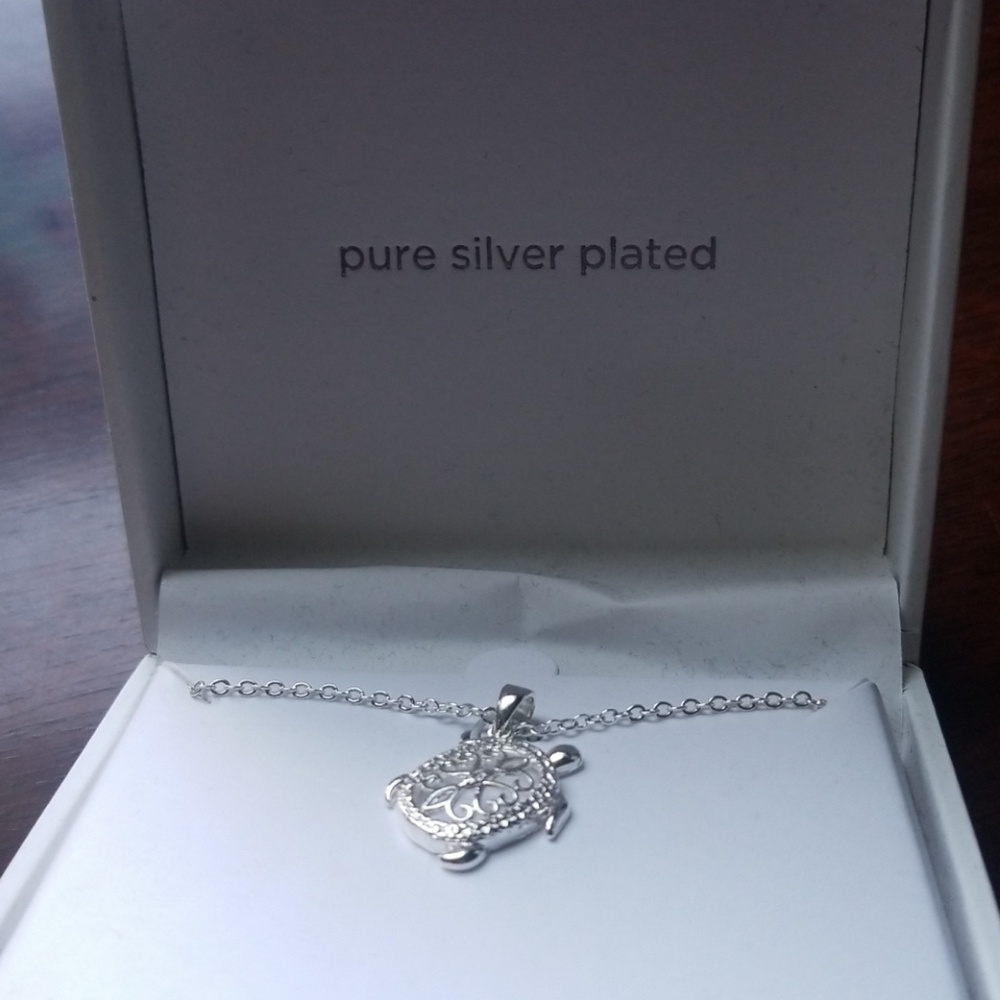 Brand new silver turtle necklace